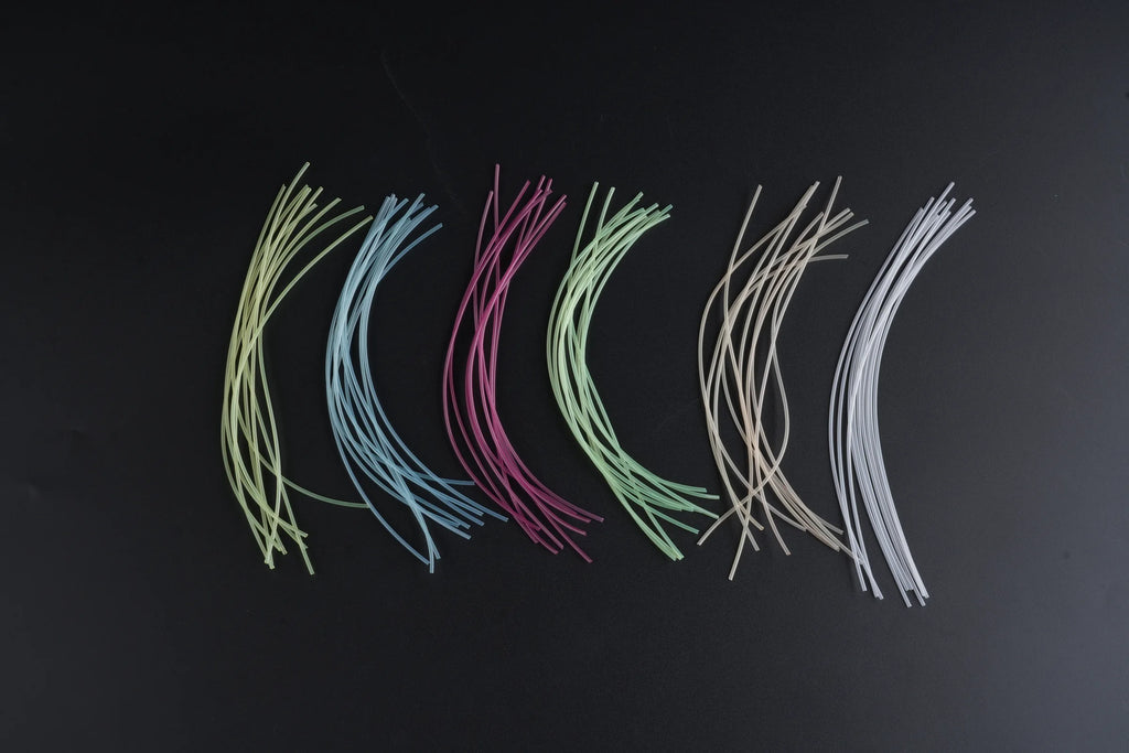 Six-color assortment of plastic tube fly tying tubes